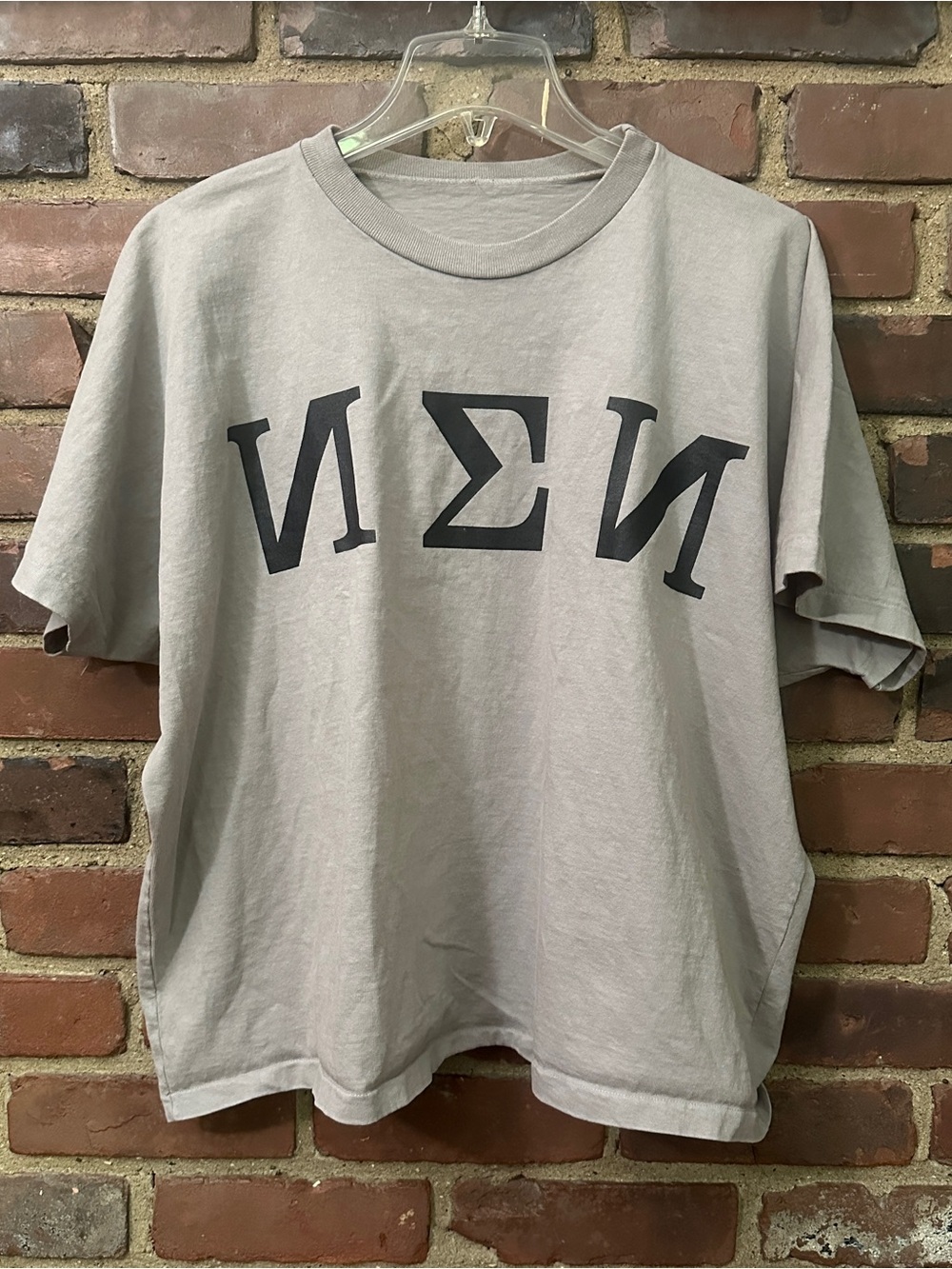 grey Yeezy t-shirt features a dark print on the chest size 1 / small